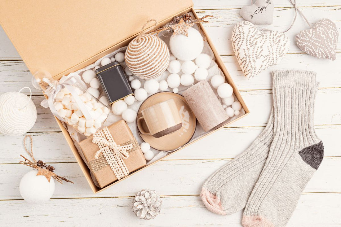 Gift Box with Tea, Candle, Cup and Woolen Socks